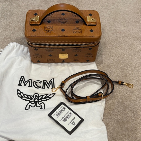 MCM Handbags - MCM Cognac Visetos Vanity Case with Gold Hardware